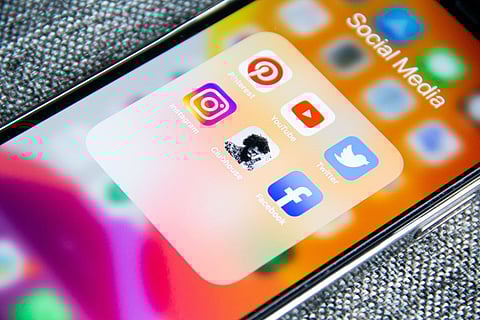 A mobile phone screen showing social media application icons