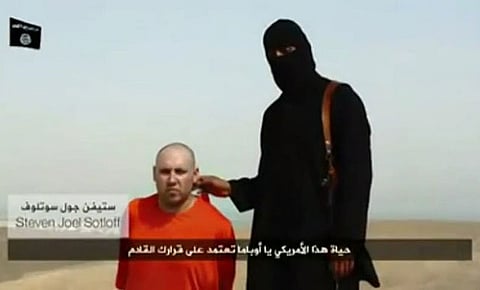 Beheading video authentic, Obama vows to punish Islamic State
