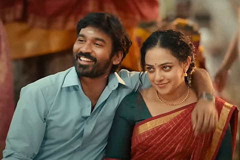 Thiruchitrambalam poster featuring Dhanush and Nithya Menen