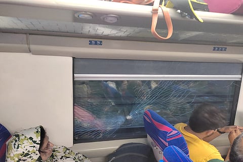 A damaged window of Mysuru-Chennai premium Vande Bharat express