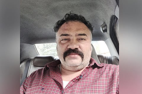 Vineeth Thattil sitting in a car