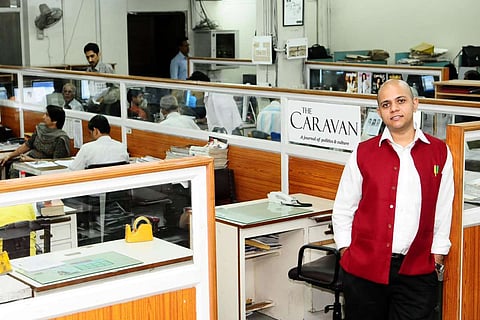 A an image of Vinod Jose in the Caravan newsroom