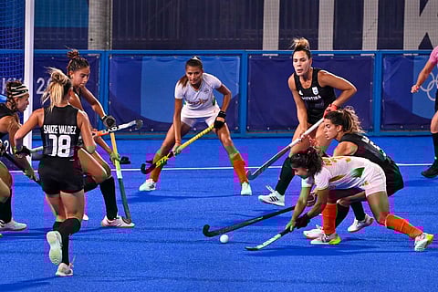 India's Neha Goyal takes an unsuccessful charge towards goal during their women's field hockey semifinal match against Argentina, at the 2020 Summer Olympics in Tokyo.