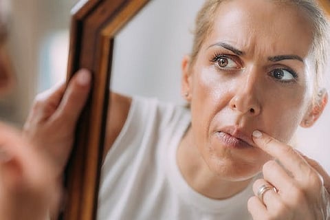 Those with body dysmorphic disorder often check themselves – and their perceived defects.
