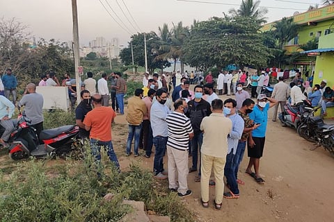 The Electronic City community gathering over a lake rejuvenation project