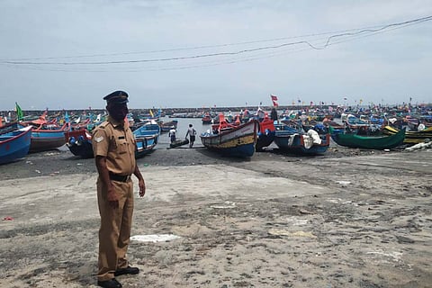 Police officer deployed at fishing harbour in Kerala