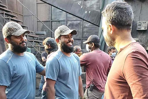 Director of 'KGF: Chapter 2' Prashanth Neel with stunt coordinator duo Anbariv