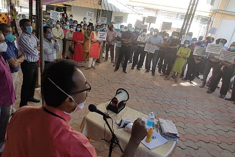 Leader speaking at a KGMCTA protest in Thiruvananthapuram Medical College hospital