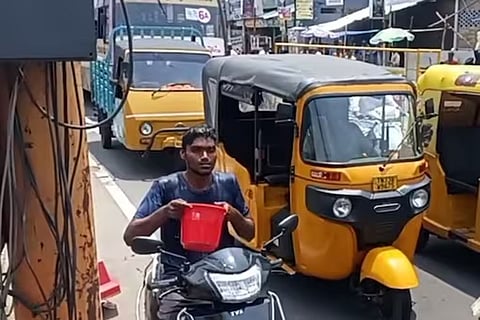 Parthiban at a traffic junction in Erode
