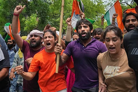 Sangeeta Phogat, Bajrang Punia, Vinesh Phogat