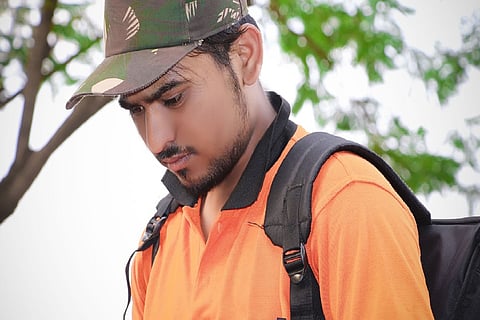 Representative image of a gig worker out for food delivery