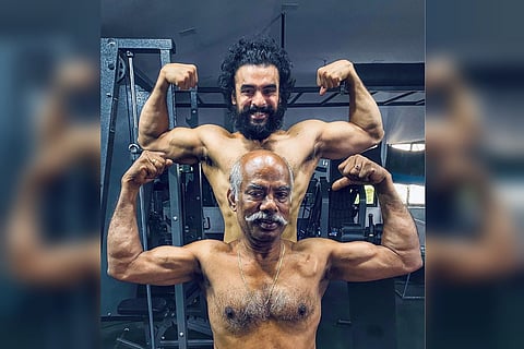 Tovino Thomas and dad work out