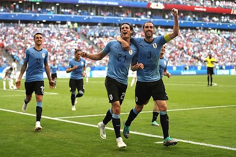 World Cup: Uruguay beat Russia 3-0 to top Group A