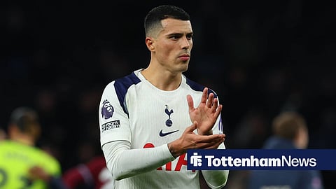 Pedro Porro applauding Tottenham fans at the end of a game
