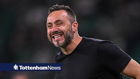 Roberto De Zerbi smiling at Tottenham