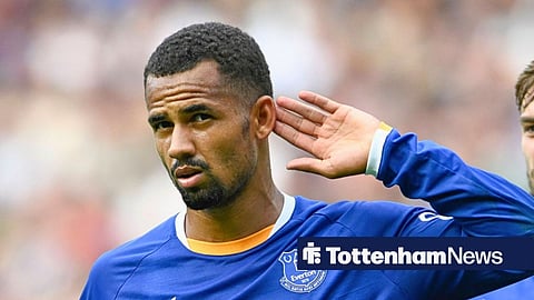 Iliman Ndiaye gesturing with his hand on his ear while playing for Everton
