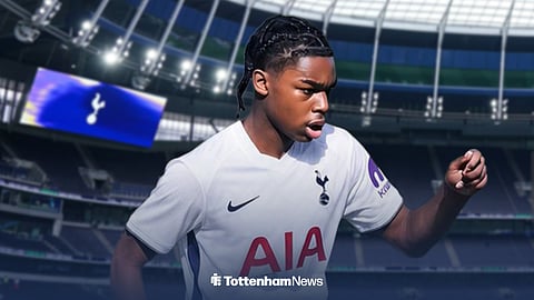 Gabriel Rigg in a Tottenham Hotspur shirt with the Tottenham Hotspur Stadium background