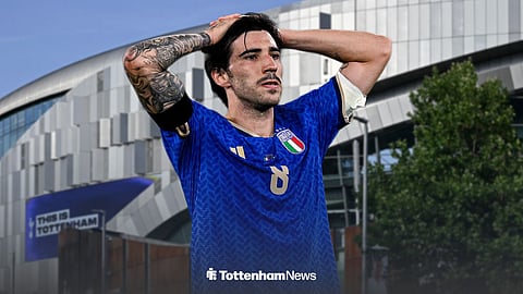 Sandro Tonali with his hands on his head in a Italy shirt ahead of the Tottenham Hotspur Stadium.