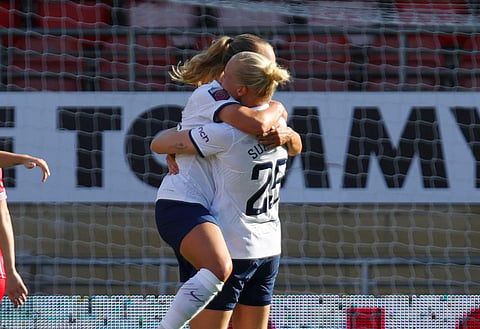 Olga Ahtinen and Eveliina Summanen in action for Tottenham Women.