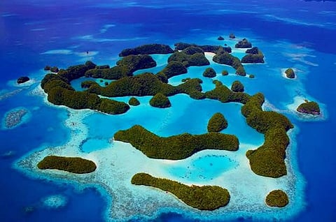 FILE PHOTO: An undated handout photo received on 28 October 2015 shows Palau's Rock Islands as the tiny Pacific island nation of Palau, created one of the world's largest marine sanctuaries, saying it wanted to restore the ocean for future generations. (Photo by AFP / THE PEW CHARITABLE TRUSTS / Matt RAND)