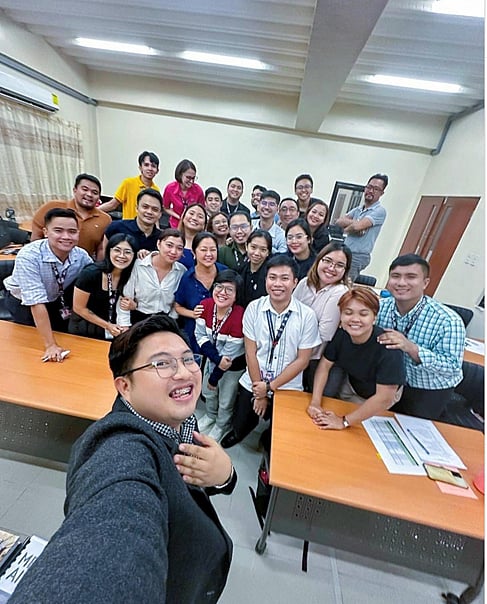 FIRST Lady Liza Marcos is reunited with her students at the West Visayas State University where she teaches courses on law. 