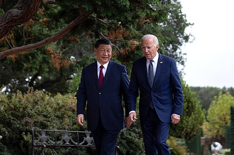 US President Joe Biden (R) and Chinese President Xi Jinping walk together after a meeting during the Asia-Pacific Economic Cooperation Leaders' week in Woodside, California on 15 November 2023. Biden and Xi will try to prevent the superpowers' rivalry spilling into conflict when they meet for the first time in a year at a high-stakes summit in San Francisco on Wednesday. With tensions soaring over issues including Taiwan, sanctions and trade, the leaders of the world's largest economies are expected to hold at least three hours of talks at the Filoli country estate on the city's outskirts.