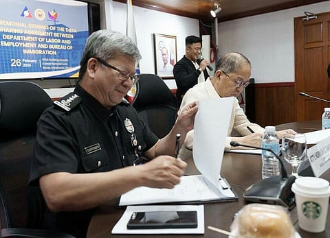 (FILE PHOTO) BI Commissioner Norman Tansingco, together with DOLE Secretary Bienvenido Laguesma, signed a new data-sharing agreement to stop illegal aliens in the country, on 27 February 2024, at the BI Main Office in Intramuros, Manila.