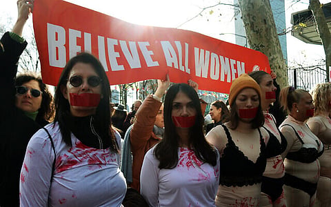 Protestors gather outside the UN headquarters in New York City on December 4, 2023, to protest the international community's perceived silence on sexual violence committed by Hamas terrorists against Israeli women during the October 7 massacre. 