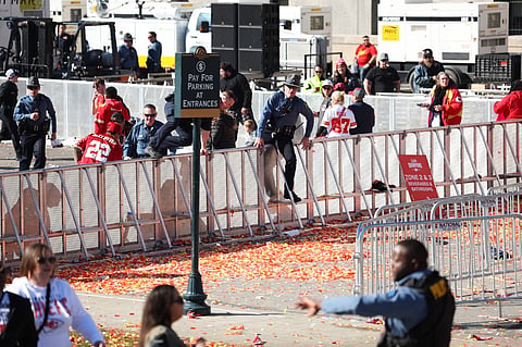 Law enforcement responds to a shooting at Union Station during the Kansas City Chiefs Super Bowl LVIII victory parade on February 14, 2024 in Kansas City, Missouri. Several people were shot and two people were detained after a rally celebrating the Chiefs Super Bowl victory. 