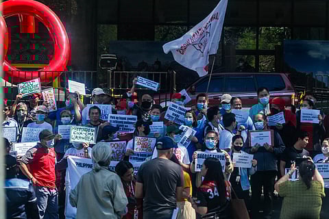 (FILES) The Philippine Heart Center Employees Association hold a protest in front Philippine Heart Center on Wednesday, 8 February 2024 to demand a salary increase among its employees. 