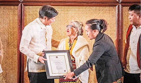 President Ferdinand Marcos Jr. pays homage to the rich tapestry of Philippine culture and heritage by bestowing the esteemed Presidential Merit Award upon the venerable indigenous tattoo artist, Apo Whang Od. She is revered for her mastery of ancient tattoo techniques.