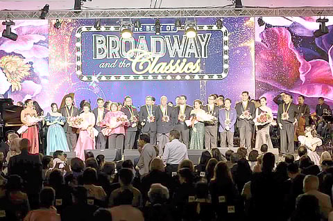 RC MAKATI officers join The Best of Broadway and the Classics’ stellar performers onstage at the end of the show. Shown (from left) are Jenn Lopez, PP Eddie Yap’s granddaughter, Byeong In Park, Rachel Gerodias, Top Gun president JM Yupangco, past president Raissa Hechanova-Posadas, Marlon Chen, past president Eddie Yap, president Bing Matoto, Nomher Nival, Lara Maigue, Sherwin Sozon, past president Louie Aseoche, Gian Magdangal, Shiela Martinez and Jang Lopez. 