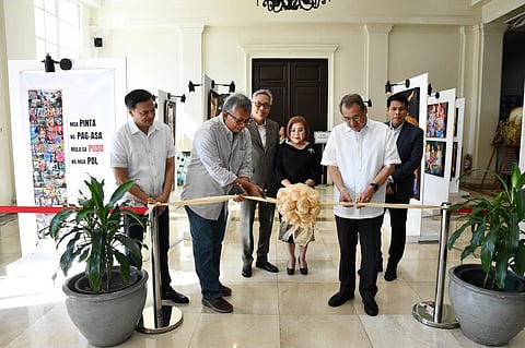 Chief Justice Gesmundo cuts the ceremonial ribbon to open the entitled “Mga Pinta ng Pag- asa Mula sa Puso ng mga PDL“ Art Exhibit and Sale at the Supreme Court main lobby. Assisting the Chief Justice are Associate Justices Jose Midas P. Marquez. Alfredo Benjamin S. Caguioa, Rodil V. Zalameda, Amy C. Lazaro Javier, and Ricardo R. Rosario. 