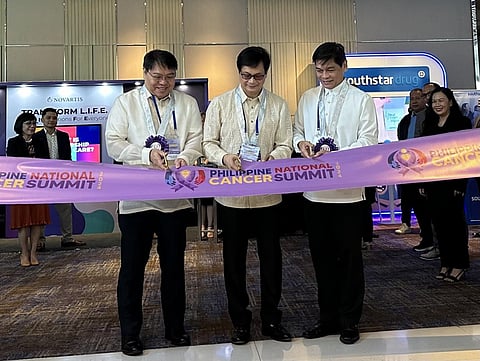 PCS Cancer Commission Chair, Dr. Ramy Roxas; DILG Secretary Benjamin Abalos Jr.; and Philippine Cancer Head, Dr. Alfonso Nunez III, officially open the 2024 Philippine National Cancer Summit.
