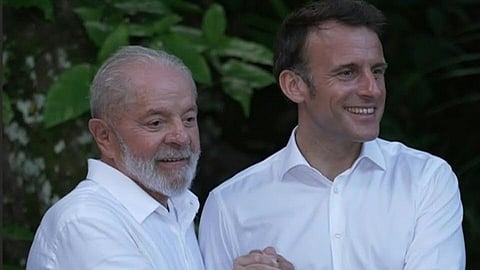French President Emmanuel Macron arrives on the island of Combu off the coast of Belem, in the Brazilian Amazon, with his Brazilian counterpart Luiz Inacio Lula da Silva. Macron has promised to discuss closer cooperation in the fight against illegal gold mining with Brazil, where he begins an emblematic state visit lasting almost three days following his trip to French Guiana. 