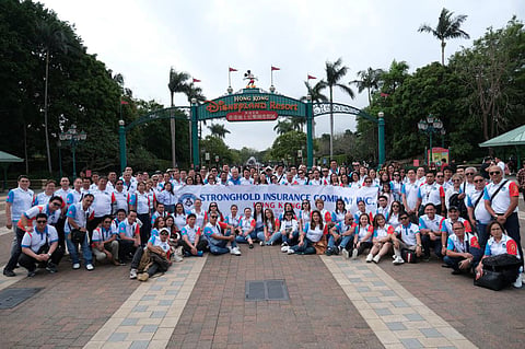 Over 100 officers, managers, and staff of Stronghold Insurance in Disneyland Hong Kong to celebrate its 64th Anniversary.