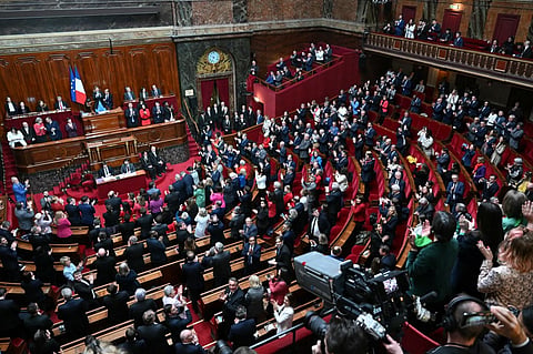 Mps and senators applaud after President of the National Assembly Yael Braun-Pivet announced the result of the vote during the convocation of a congress of both houses of parliament in Versailles, southwestern of Paris, on March 4, 2024, to anchor the right to abortion in the country's constitution.
