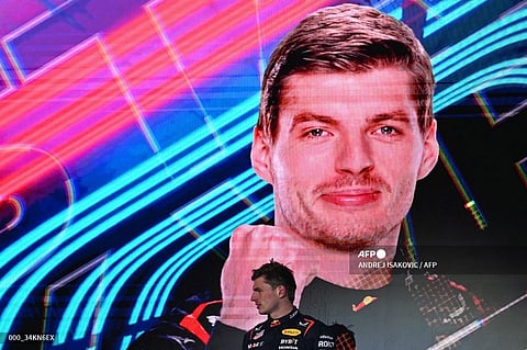 First-placed Red Bull Racing's Dutch driver Max Verstappen celebrates on the podium of the Bahrain Formula One Grand Prix at the Bahrain International Circuit in Sakhir on 2 March 2024.