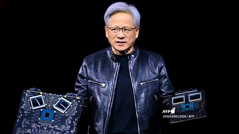 NVIDIA's CEO Jensen Huang displays products on-stage during the annual Nvidia GTC Artificial Intelligence Conference at SAP Center in San Jose, California, on 18 March 2024.