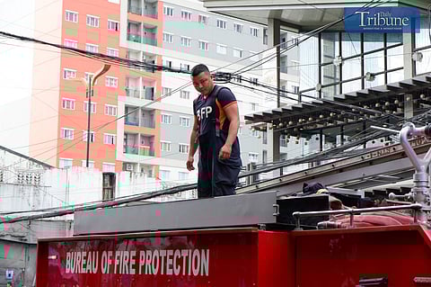 Firefighters refilling water