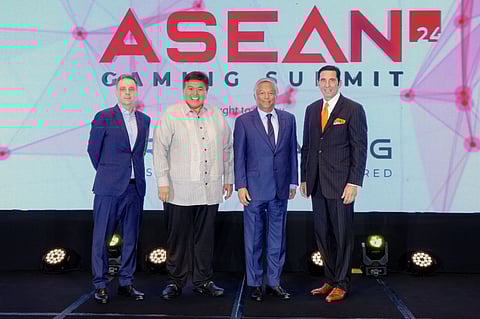PAGCOR chairman and CEO 
 Alejandro H. Tengco (2nd from right) joins (from left) Asia Gaming Brief managing director Luis Pereira, Parañaque 2nd District Representative Gus Tambunting and Bloomberry Resorts Corp. president and COO Thomas Arasi during the opening of this year’s ASEAN Gaming Summit.