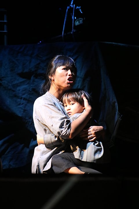 Abigail Adriano as Kim. 