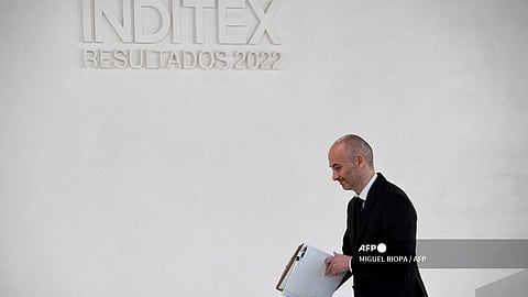 Spanish textile giant Inditex CEO Oscar Garcia Maceiras leaves after a press conference to announce Inditex group 2022 earnings at the headquarters in Arteixo, in the northwestern Spanish region of Galicia on 15 March 2023. Inditex, the world's biggest fashion retailer, reported record profits for 2022 despite halting operations in Russia and soaring global inflation.
