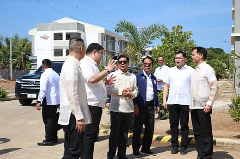 President Ferdinand Marcos Jr. leads the Ceremonial Turnover of the NHA Balanga City Low-Rise Housing Project at Barangay Tenejero Balanga City Bataan. With him are Bataan Governor Jose Enrique Garcia III, DHSUD Secretary Jose Rizalino Acuzar, NHA General Manager Joeben Tai, Bataan 2nd District Representative Albert Raymond Garcia and Balanga City Mayor Francis Anthony Garcia.
