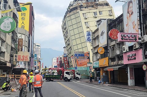 This picture released by Taiwan’s Central News Agency (CNA) on 23 April 2024 shows the Full Hotel building in Hualien, which had been previously damaged in the April 3 earthquake, tilting further to one side after a series of earthquakes overnight. Taiwan was shaken by dozens of earthquakes overnight and into 23 April that left buildings swaying and some tilting, with the government saying they were aftershocks from a huge deadly quake that hit the island more than two weeks ago.
