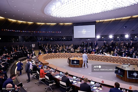 NATO Secretary General Jens Stoltenberg (C) opens a round table during the North Atlantic Council (NAC) Ministers of Foreign Affairs meeting at the NATO headquarters in Brussels on 3 April 2024.
