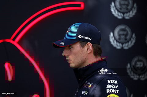 Red Bull Racing's Dutch driver Max Verstappen arrives to the paddock ahead of the Formula One Australian Grand Prix in Melbourne on 22 March 2024.
