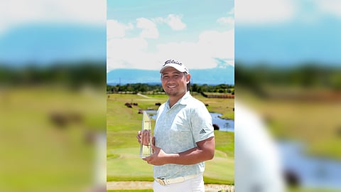Clyde Mondilla oozes with pride and joy while holding the ICTSI Caliraya Springs Championship trophy in Laguna.