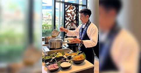Chef Akkawin Pun Pittrachart making Northern Yellow Curry Noodle.