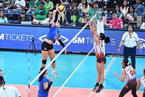 Lyann de Guzman of Ateneo de Manila University attempts to launch a rocket against University of the East in their UAAP Season 86 women’s volleyball tournament match Sunday at the Mall of Asia Arena. Ateneo won, 25-17, 23-25, 25-23, 25-16.